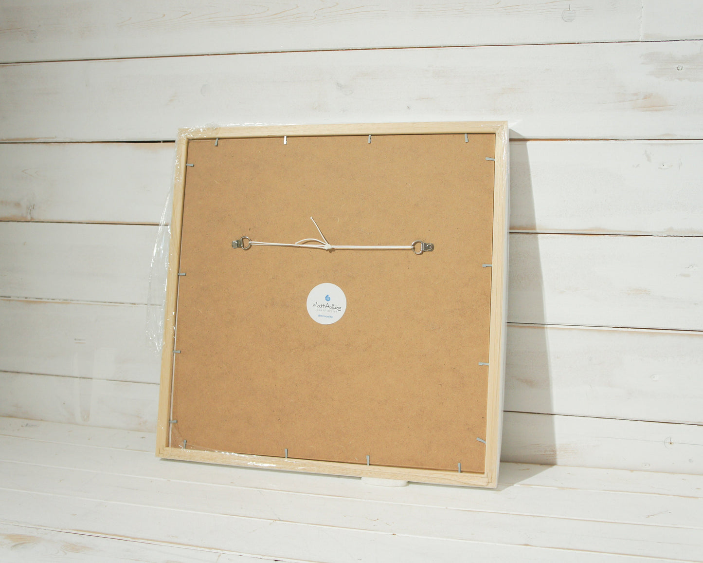 Large midnight blue ammnite glass wall art frame 45x45cm