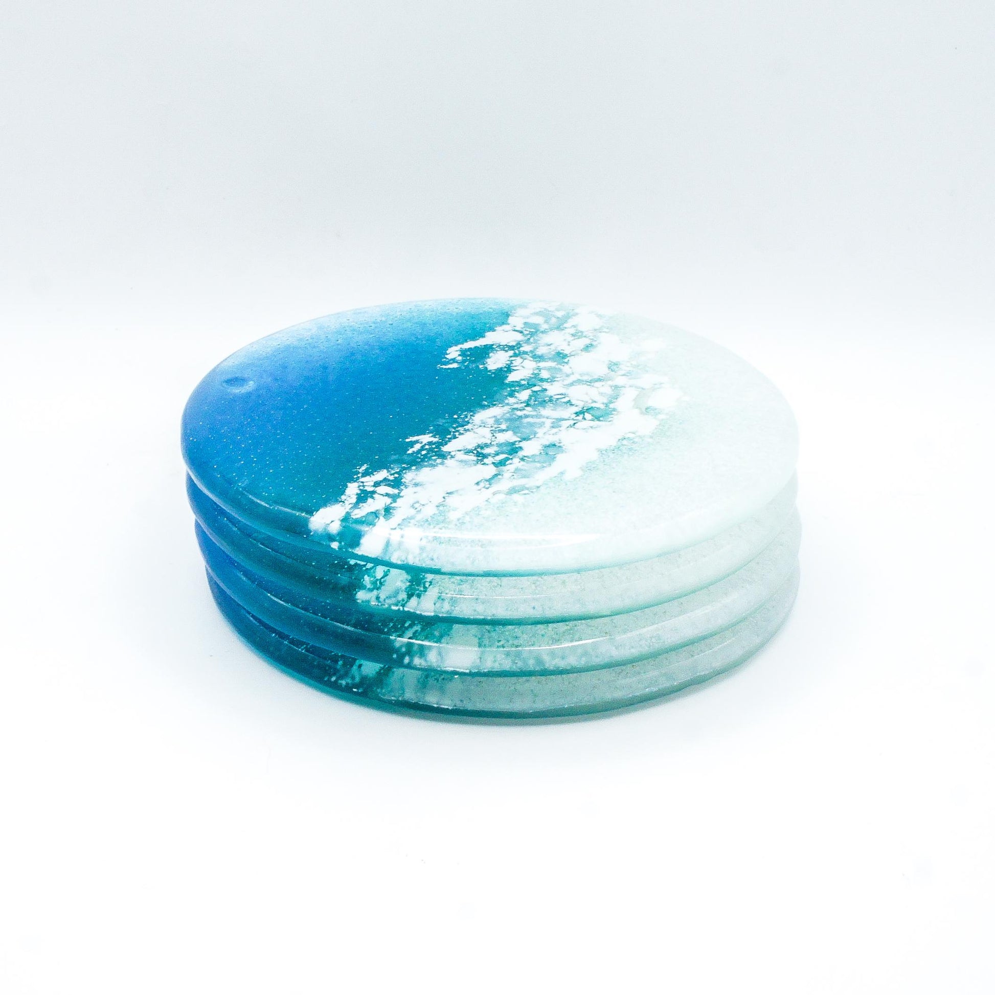 Turquoise Sea
Set of 4
Beach Fused Glass
fused glass Coasters
Beach House Decor
nautical gifts
matt adkins
gift set
seascape teal
coaster set
housewarming gift
unique gift
handmade coasters