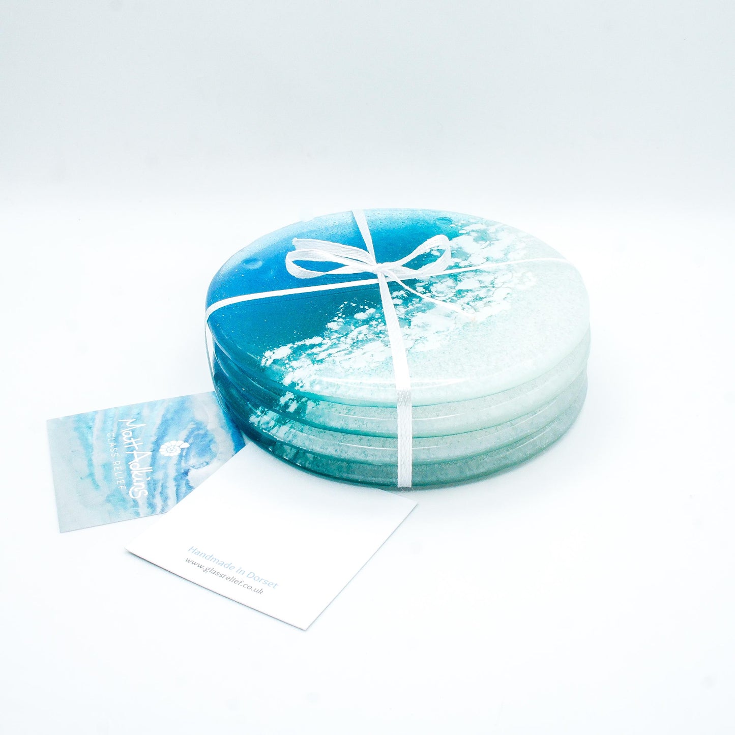 Turquoise Sea
Set of 4
Beach Fused Glass
fused glass Coasters
Beach House Decor
nautical gifts
matt adkins
gift set
seascape teal
coaster set
housewarming gift
unique gift
handmade coasters