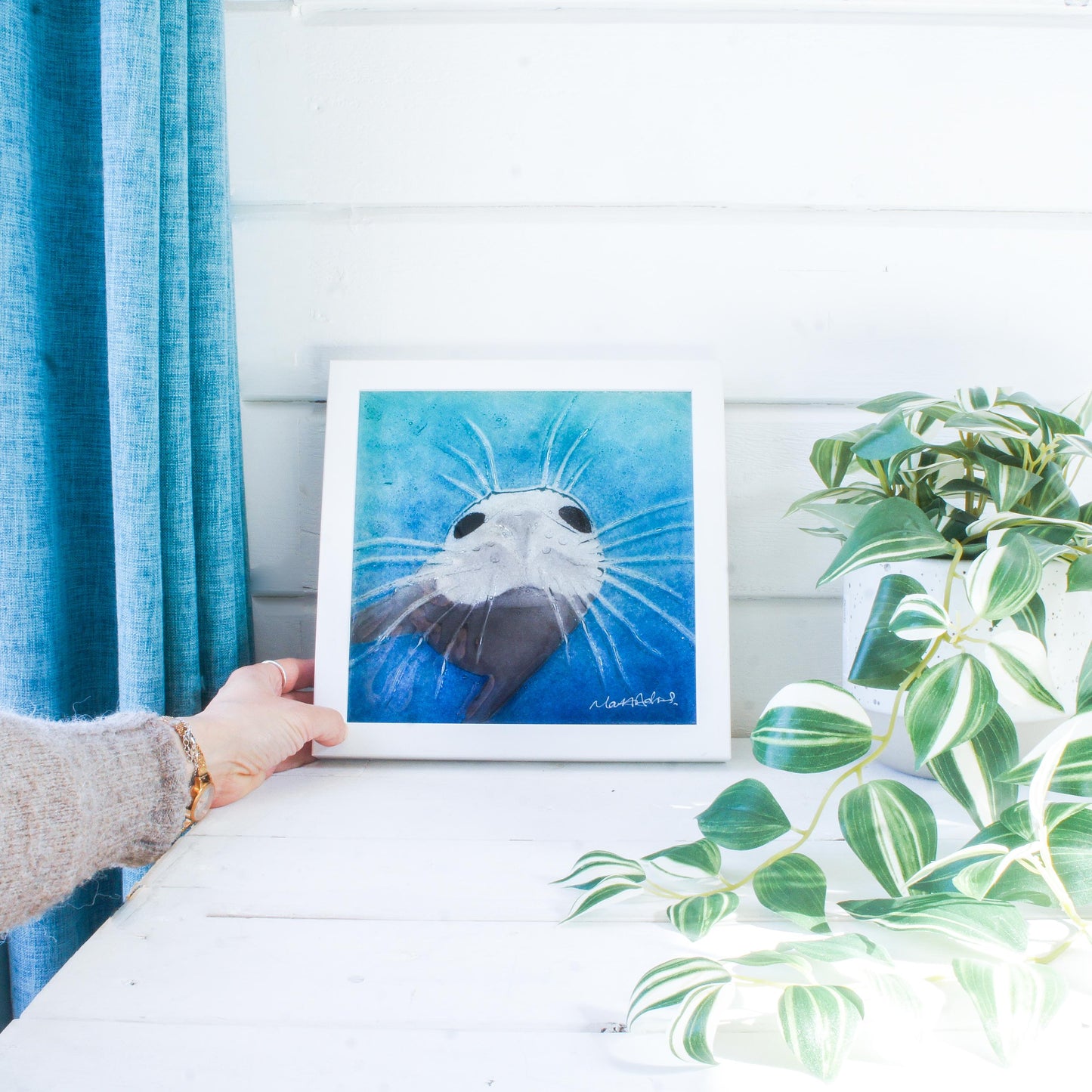 seal face fused glass art frame 25cm 10" blue teal water, underwater animal, animal print, wall art, pictureframe, unique wall art, wall hanging, handmade wall decor, vibrant piece of art, sea animal turquoise decor, sealface with moustache, cute art, seal swimming in deep sea