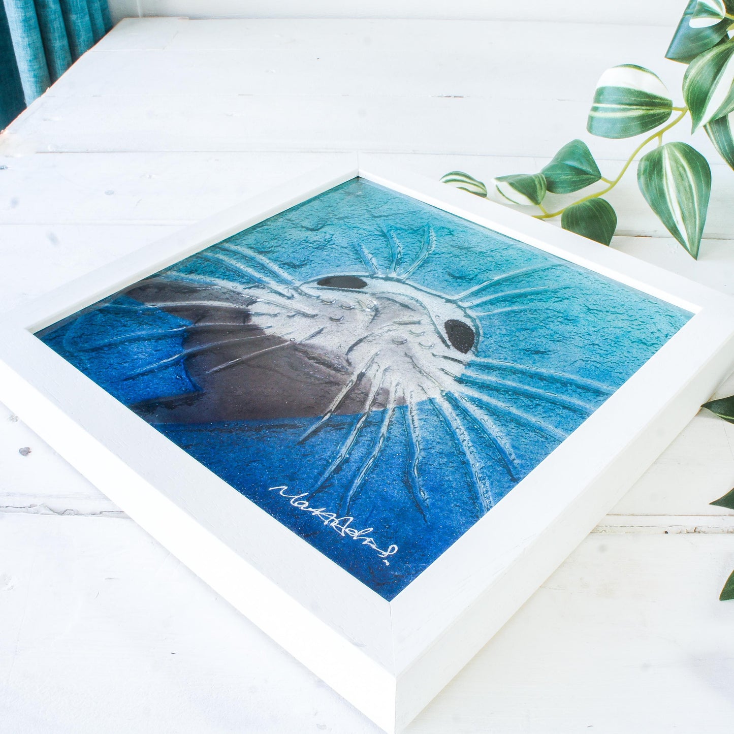 seal face fused glass art frame 25cm 10" blue teal water, underwater animal, animal print, wall art, pictureframe, unique wall art, wall hanging, handmade wall decor, vibrant piece of art, sea animal turquoise decor, sealface with moustache, cute art, seal swimming in deep sea