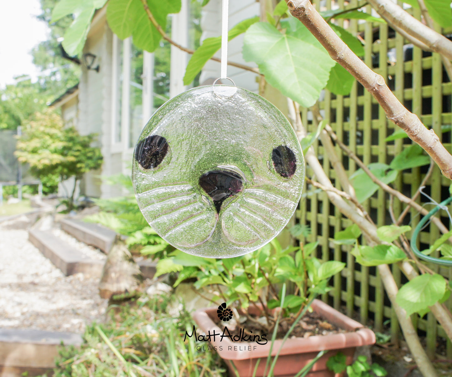 round seal face fused glass clear and black suncatcher 12cm or 5"