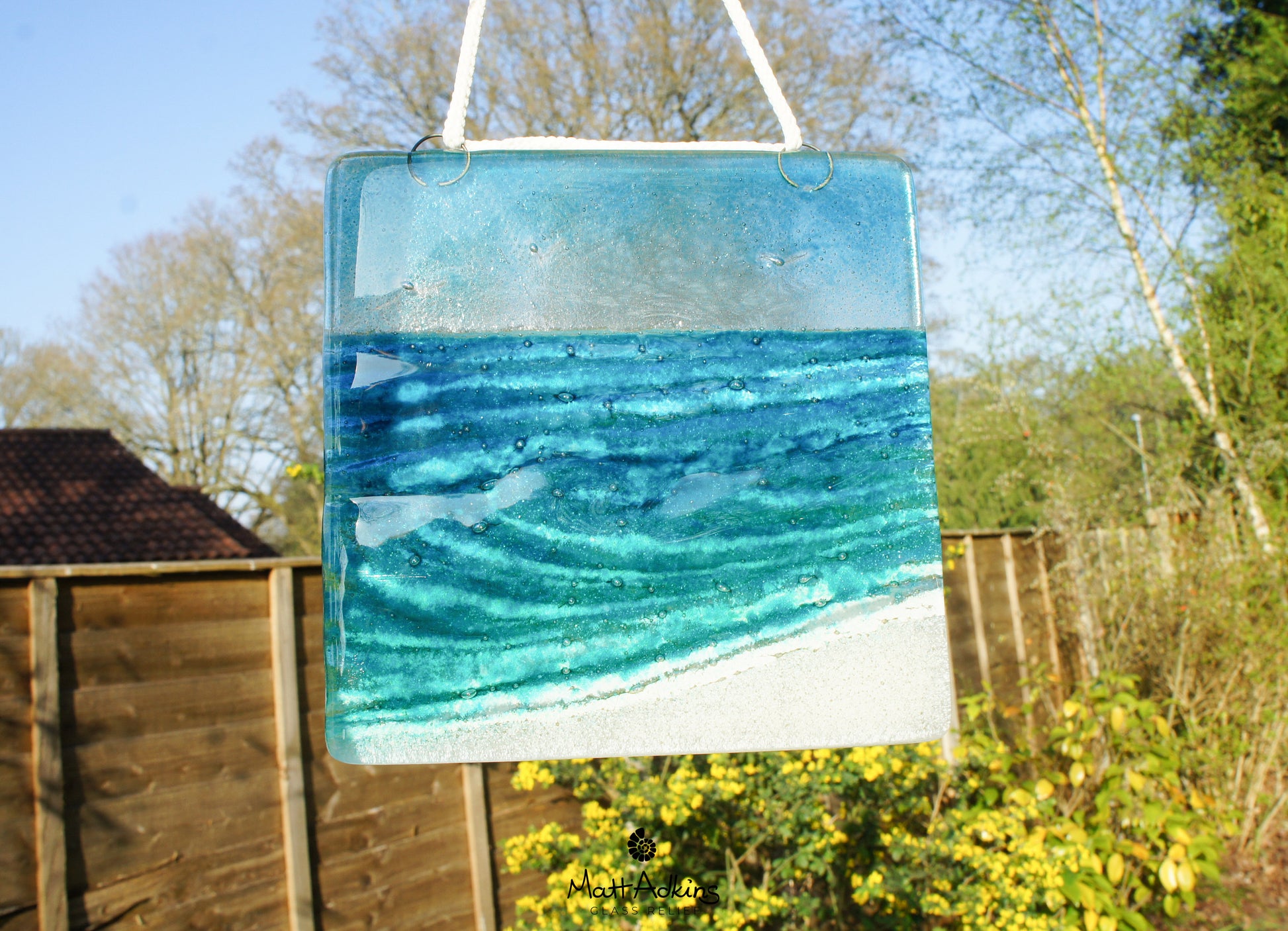 fused glass art wave ocean suncatcher hanging in window 15cm with cord