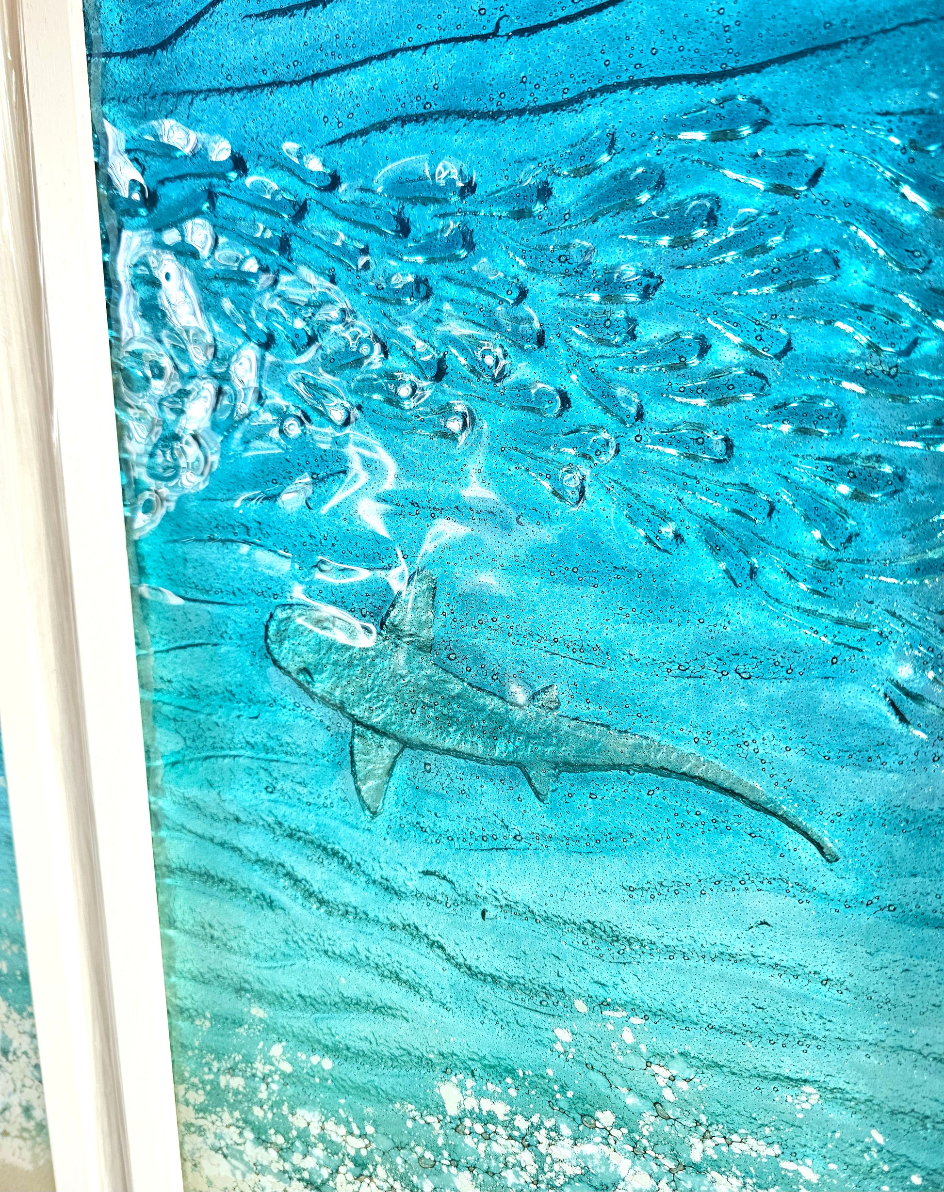 Glass panel with a shark design underwater scene