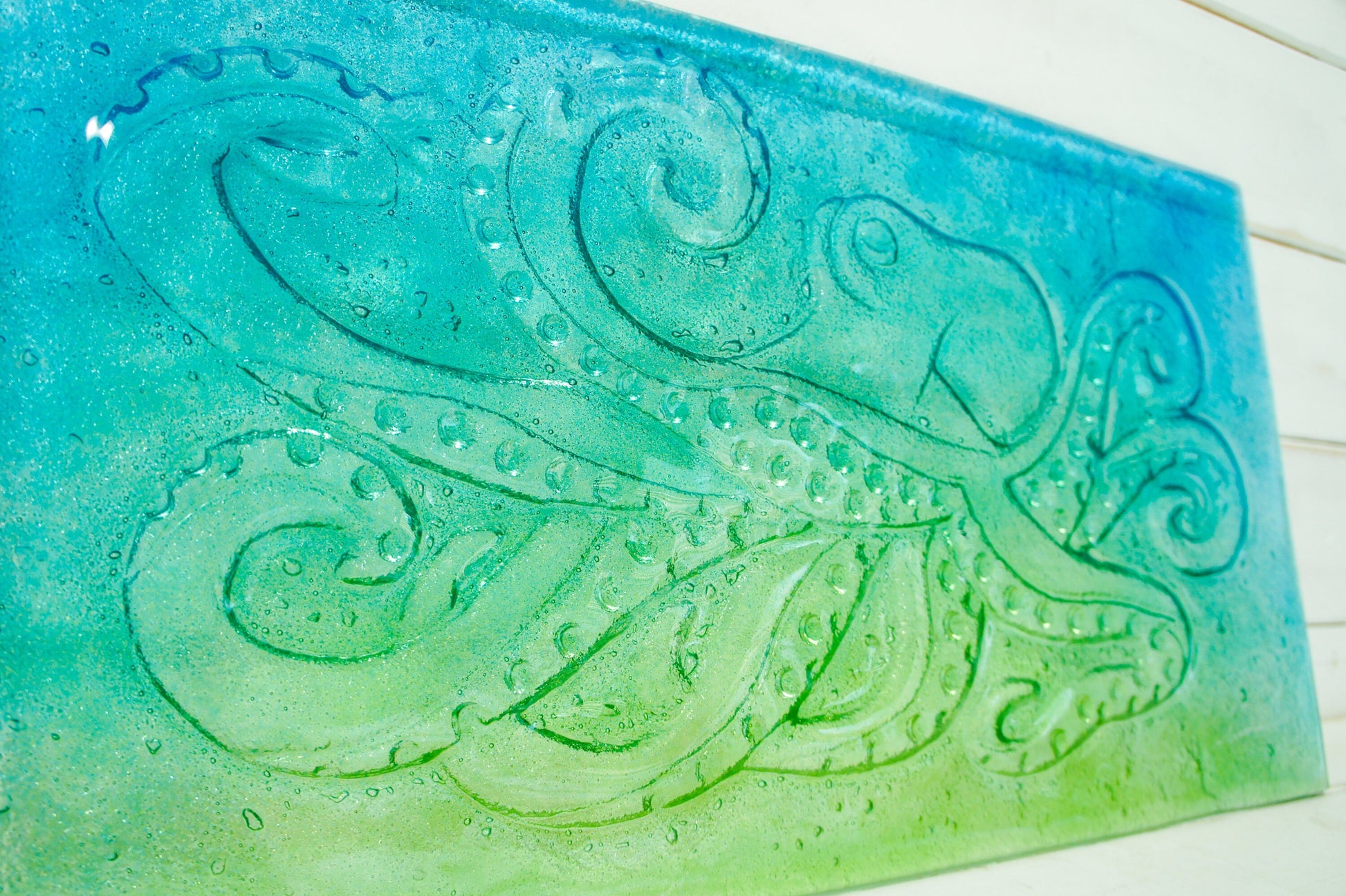 glass wall art sea life octopus in blue, lime green and turquoise 60x33cm / 23 1/2x13&quot;