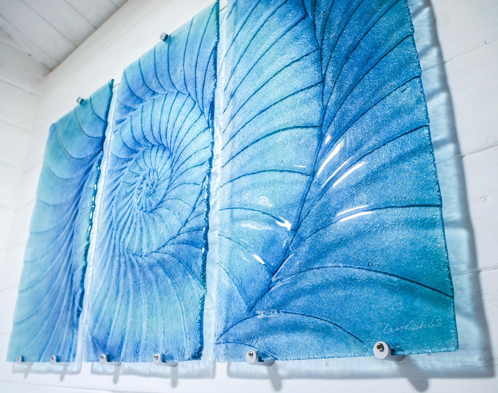 blue turquoise dark blue ammonite triptych wall art fused glass