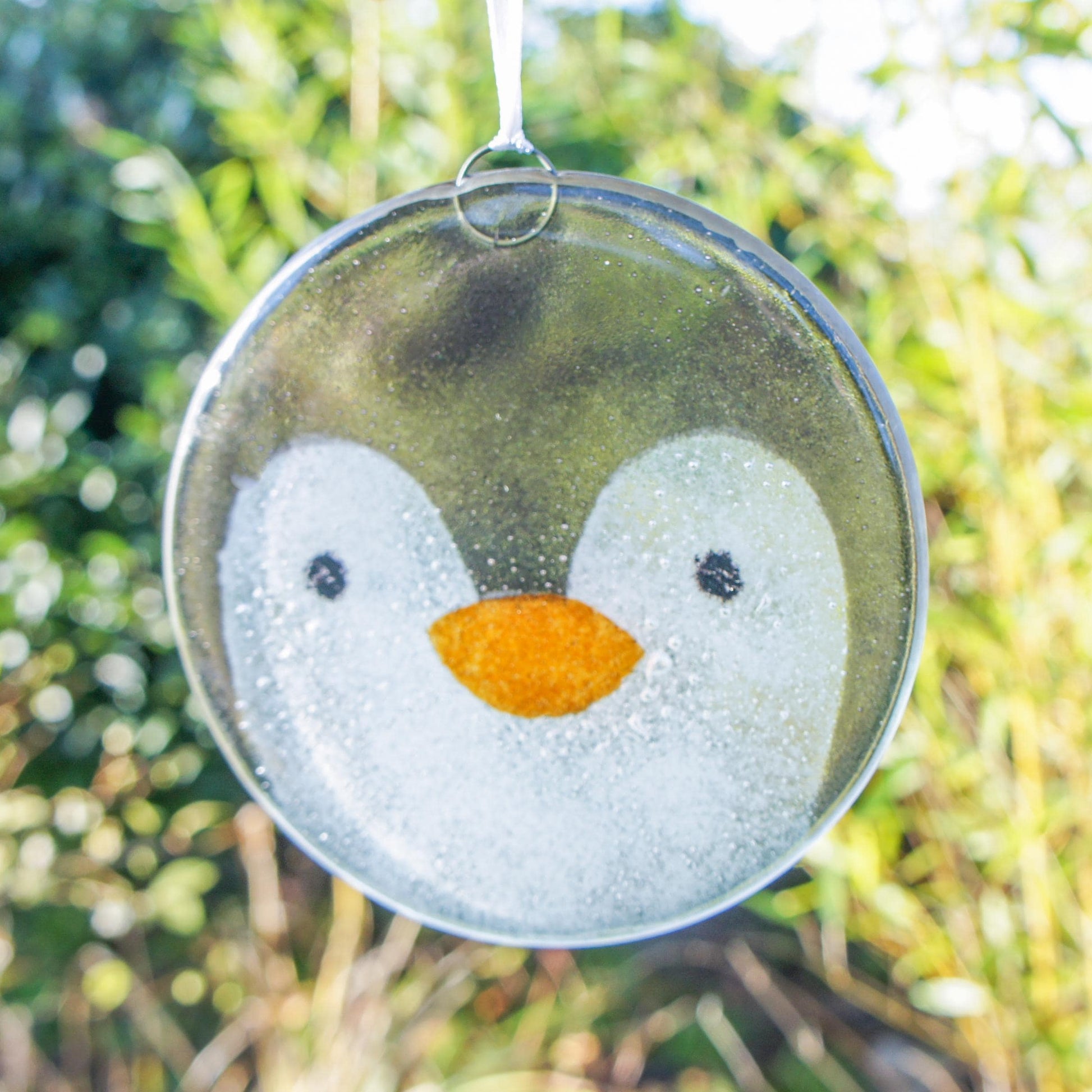 penguin fused glass round hanging ornament with ribbon