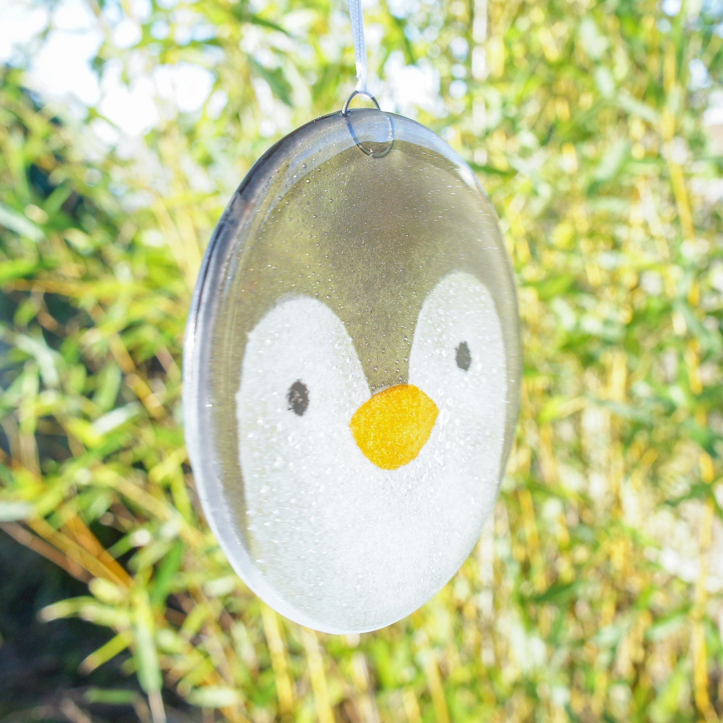 penguin fused glass round hanging ornament with ribbon