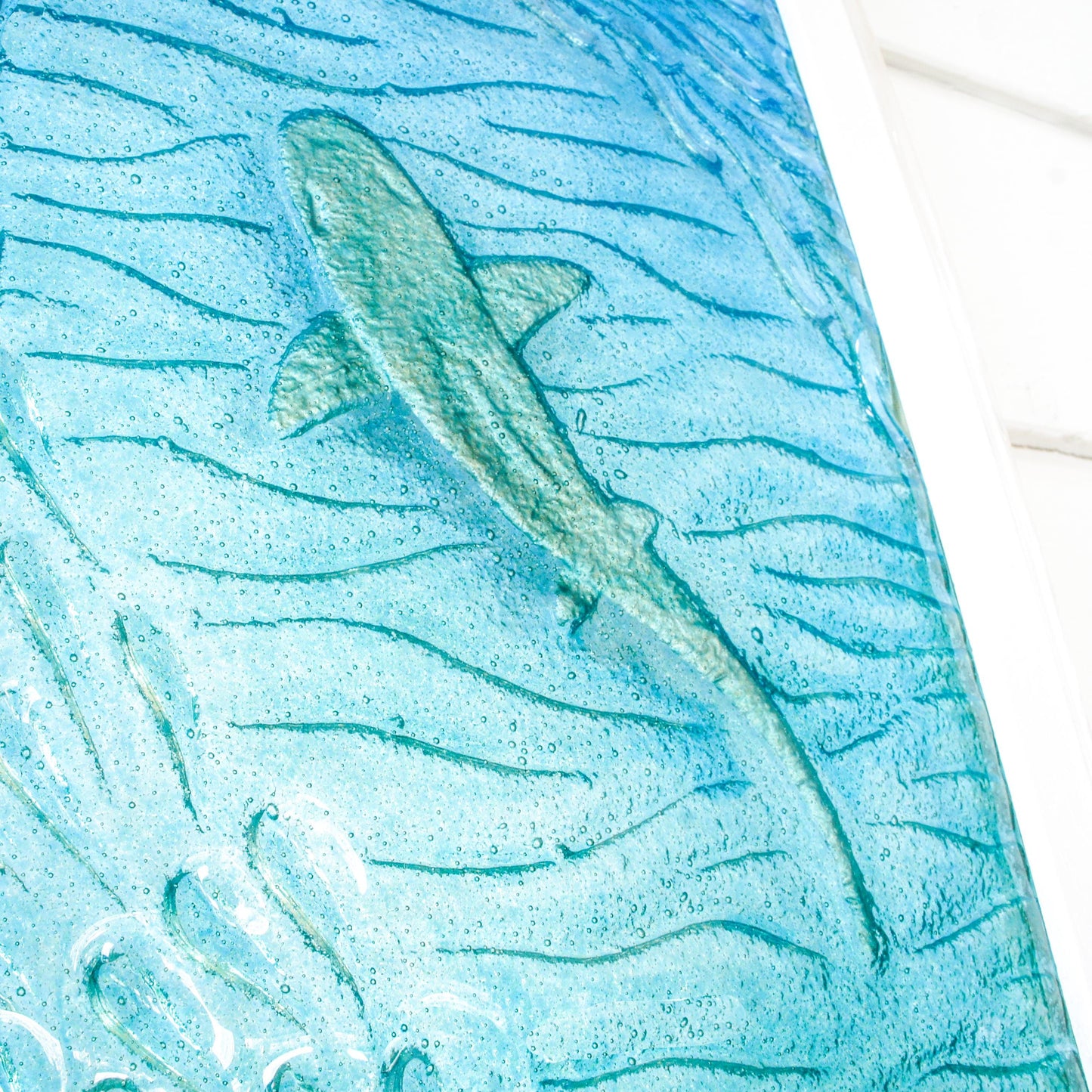 shark fused glass portrait frame in teal ocean with shoal of fish, large textured wall art for coastal home 30x60cm (12x23")