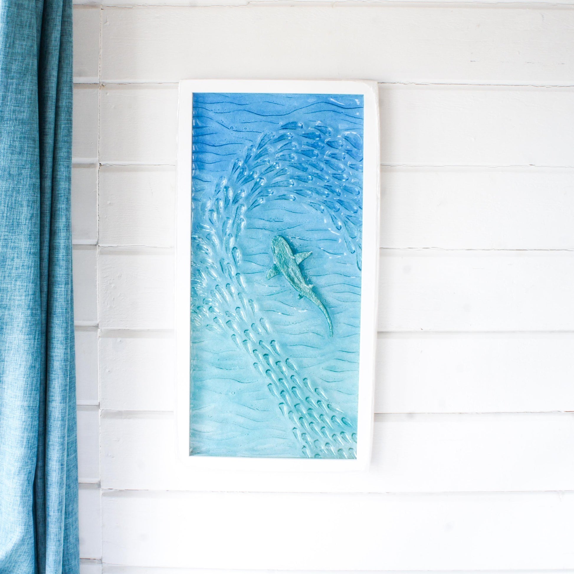 shark fused glass portrait frame in teal ocean with shoal of fish, large textured wall art for coastal home 30x60cm (12x23")
