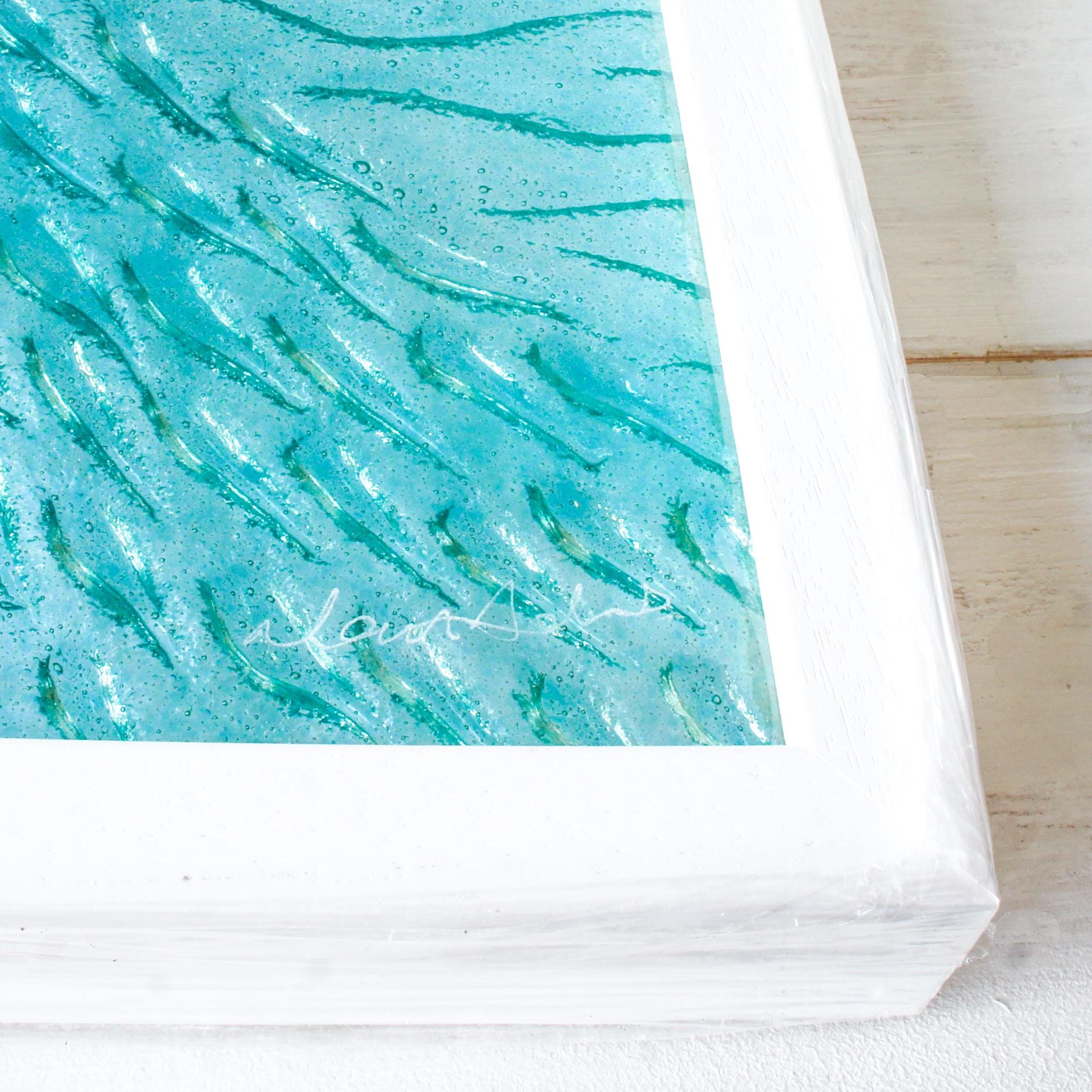shark fused glass triptych gallery wall frames in teal ocean with shark in silver and shoal of fish - XL textured wall art for coastal home showing artist'signature