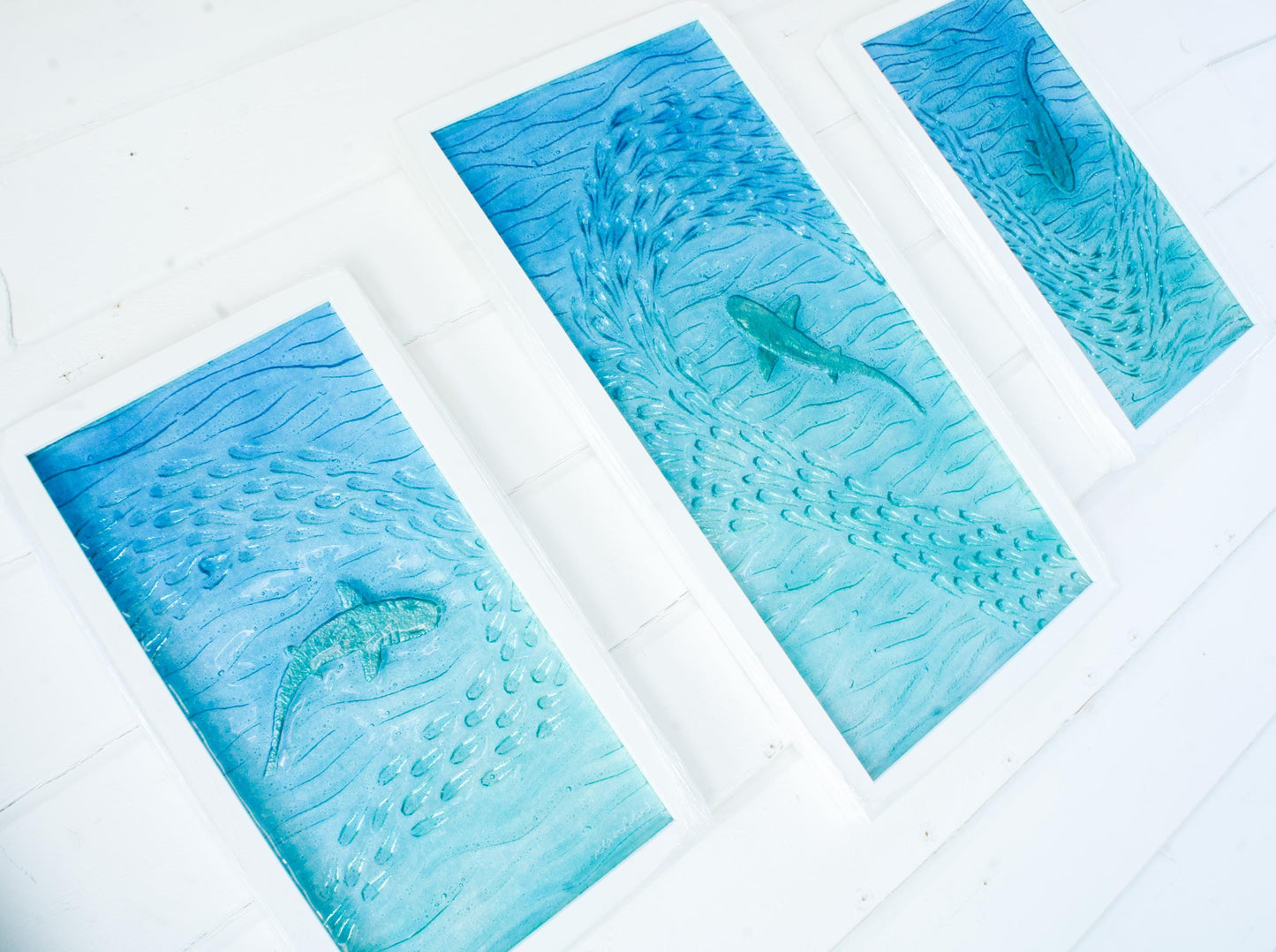 shark fused glass triptych gallery wall frames in teal ocean with shark in silver and shoal of fish - XL textured wall art for coastal home