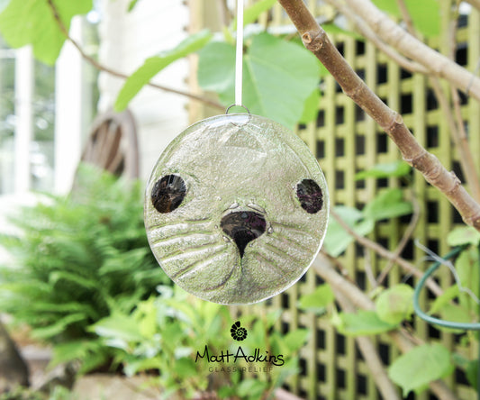 round seal face fused glass clear and black suncatcher 12cm or 5"